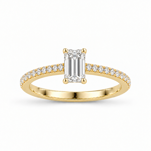 Anillo de oro amarillo 14k con diamante corte esmeralda y pavé en la banda